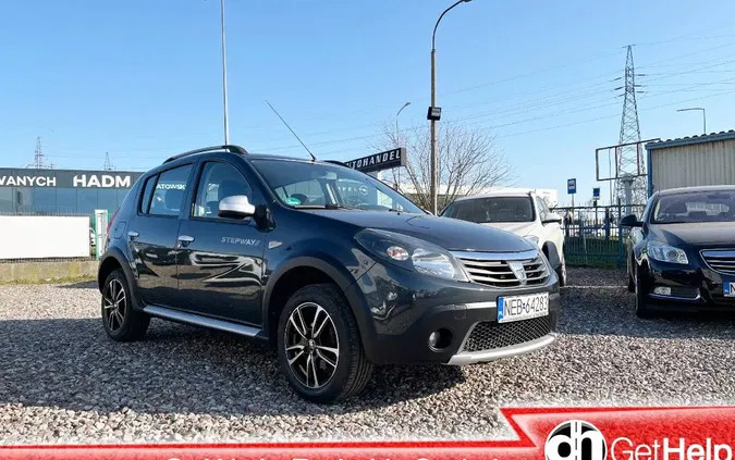 warmińsko-mazurskie Dacia Sandero cena 25900 przebieg: 143365, rok produkcji 2012 z Pobiedziska